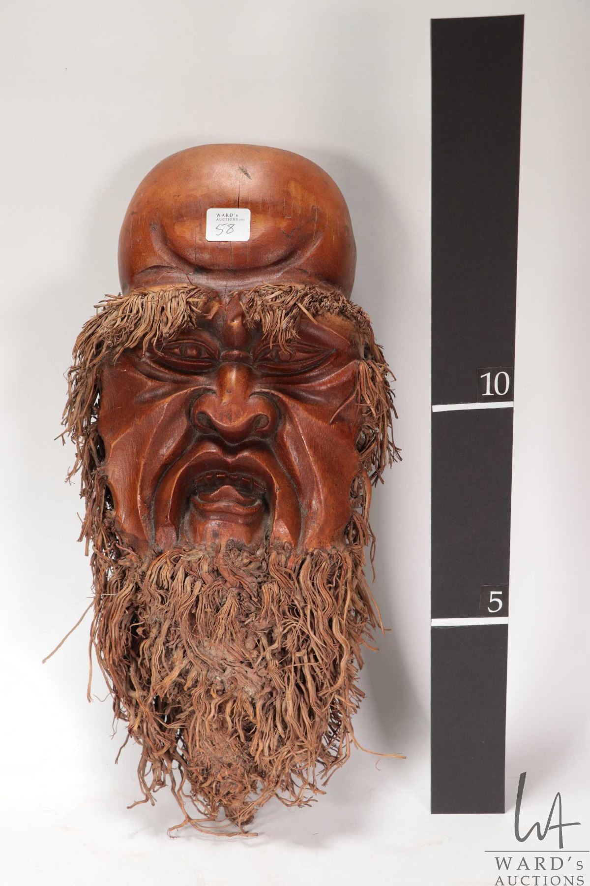 Chinese hand carved bamboo root mask with paper label