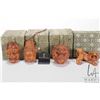 Image 2 : Four Japanese boxwood netsukes and figures including foo dogs and masks, some artist signed