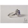 Image 2 : 14kt white gold, diamond and tanzanite gemstone ring. Set with 2.55ct oval tanzanite gemstone and .9