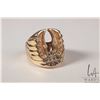 Image 1 : Gent's yellow gold and diamond Harley Davidson like/ Eagle motif ring, set with .23cfts of round ful