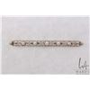 Image 1 : 14kt yellow gold and platinum capped design brooch set with five saltwater cultured pearls. Retail r