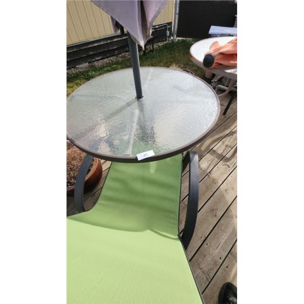 patio table with umbrella and one chair