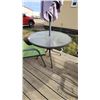 Image 4 : patio table with umbrella and one chair
