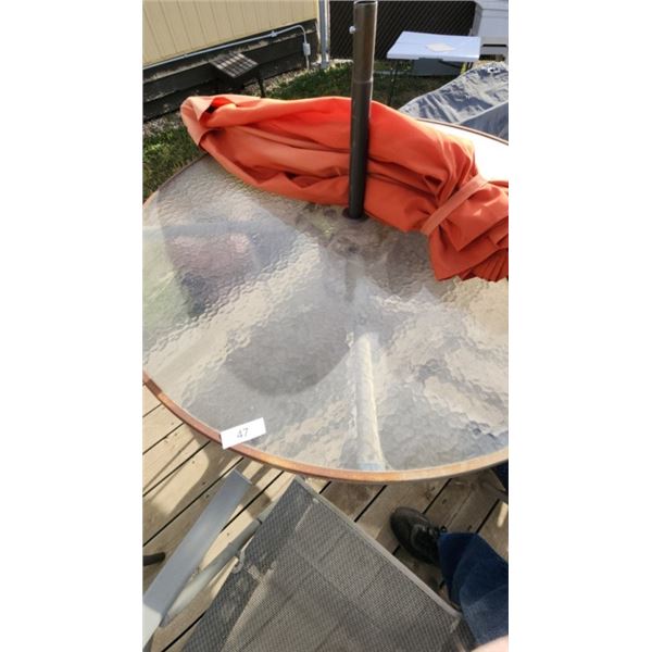 patio table with umbrella and chairs