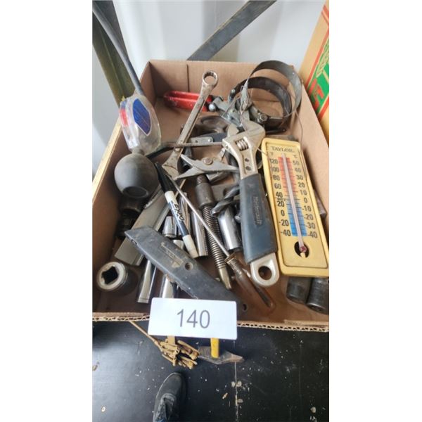 box of assorted tools