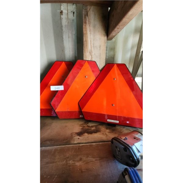 Slow moving vehicle signs