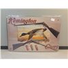 Image 1 : 8x11.75" tin sign Remington
