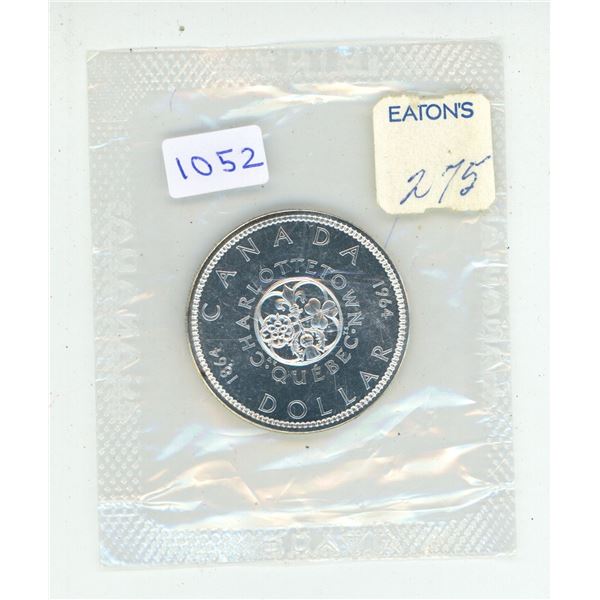 1864 – 1964 Canadian Silver Dollar. Commemorates the pre-Confederation meetings held in Cha