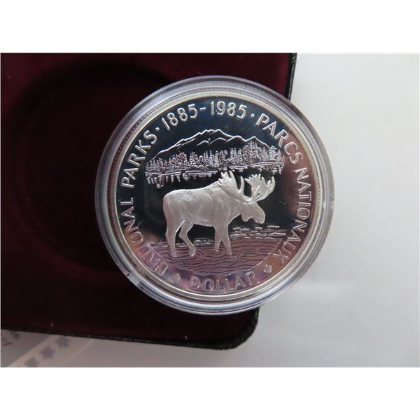 1985 Canadian Silver Dollar. Commemorates the 100th Anniversary of the National Parks of Canada. Pop