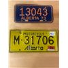 Image 1 : 2 Alberta motorcycle license plates - 1973 & 1976