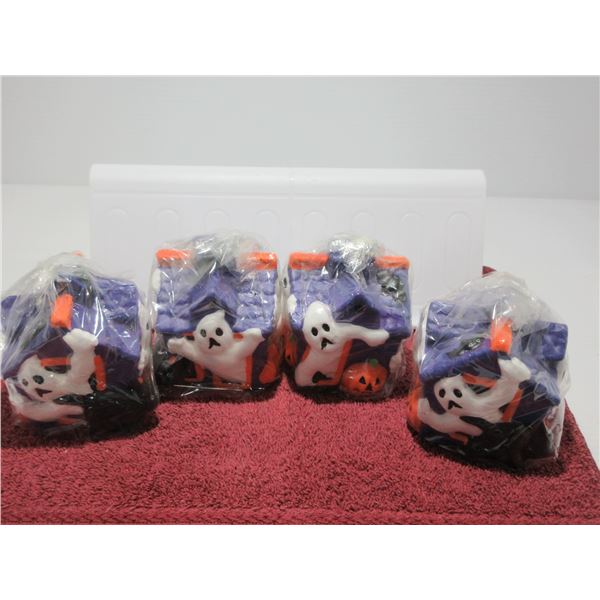 ESTATE/NEW:  4 HALLOWEEN CANDLES IN ORIGINAL PACKAGE