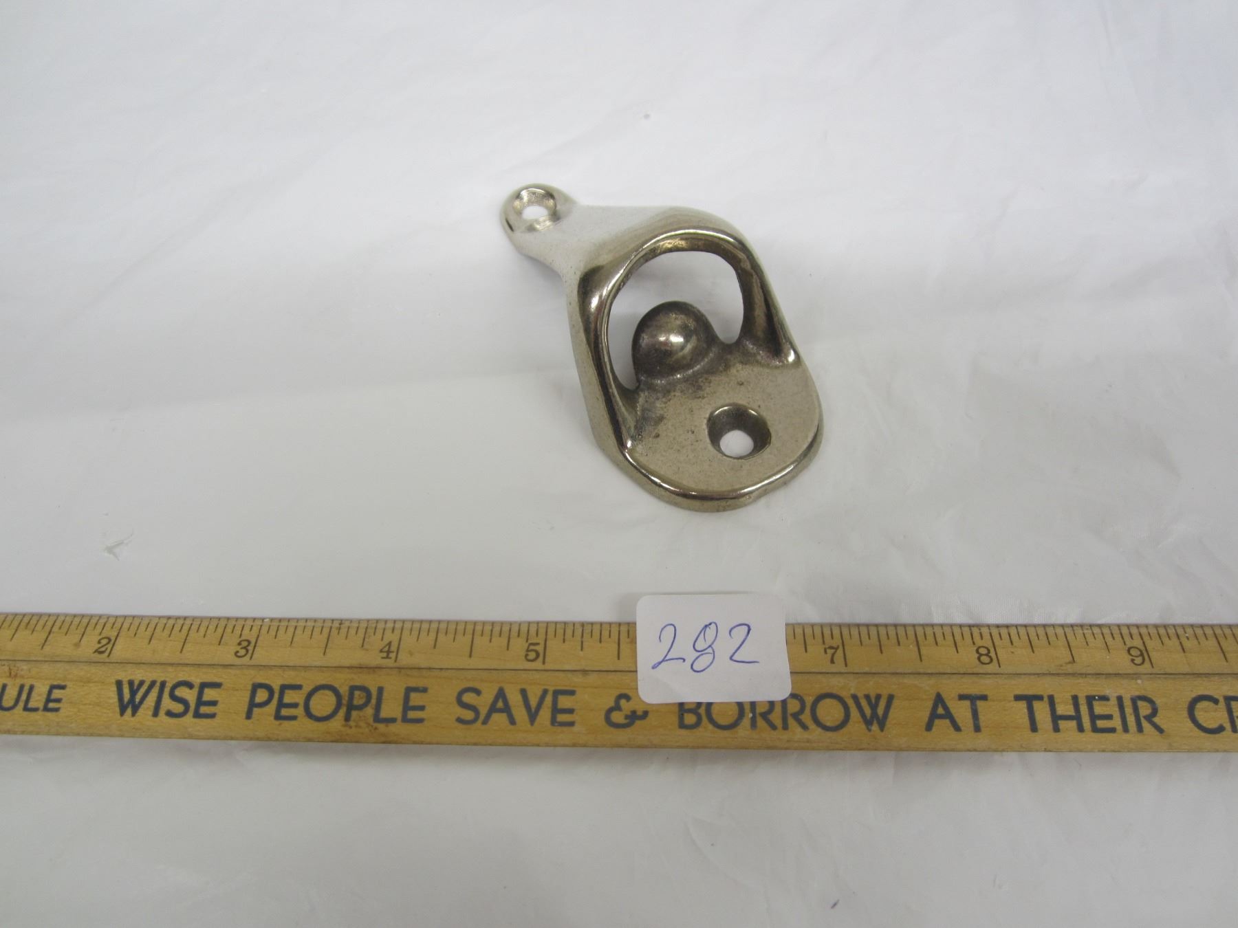 Antique Metal Wall Mount Bottle Opener - Schmalz Auctions