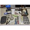 Image 1 : Collection of kitchen utensils - knives, muffin trays, recipes, etc.