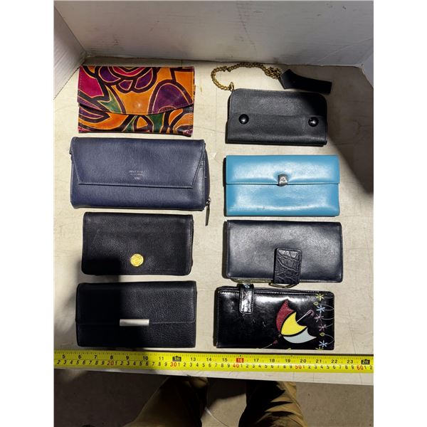 Lot of different ladies purse.