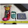Image 2 : Dog toy of automatic dog leash and empty diary.