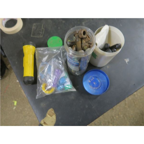 tire repair kit + flashlight + bolts