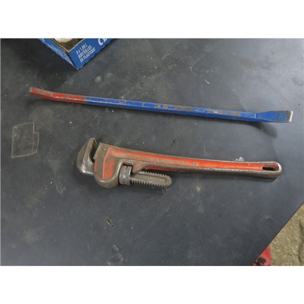 pipe wrench and crow bar