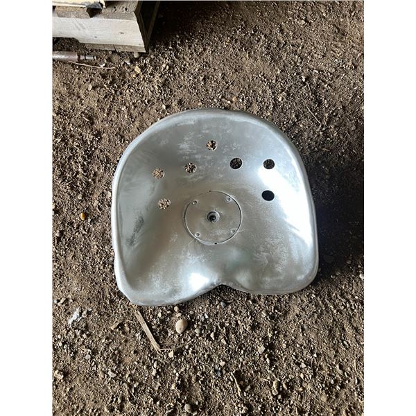 silver antique tractor seat
