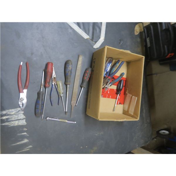 lot of tools, screwdrivers, etc.