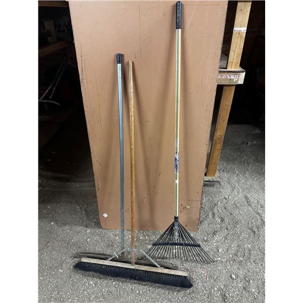 A broom, Squeegee and Rake.