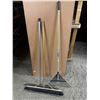 Image 1 : A broom, Squeegee and Rake.