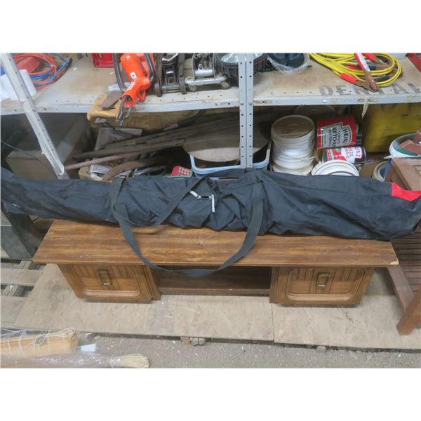 set of downhill skis with case