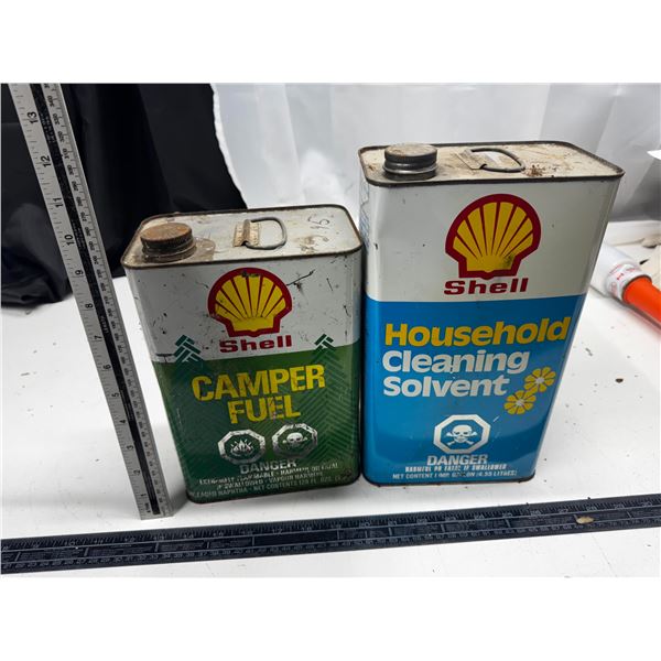 Empty Tins of Shell Camper Fuel and Household Cleaning Solvent.