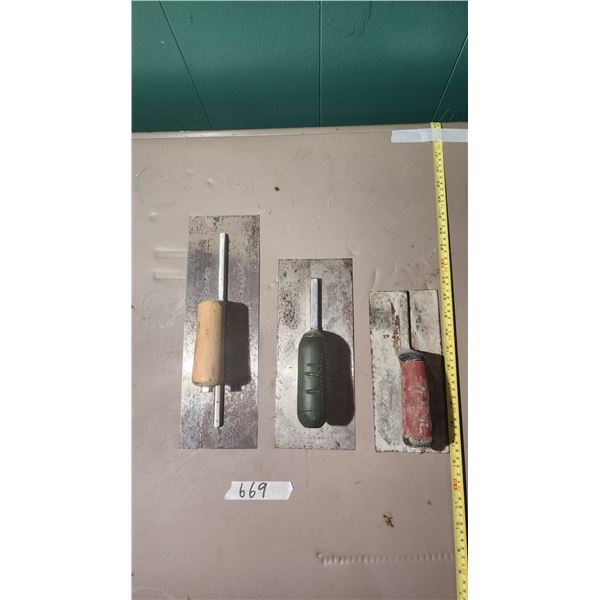 3 concrete trowels