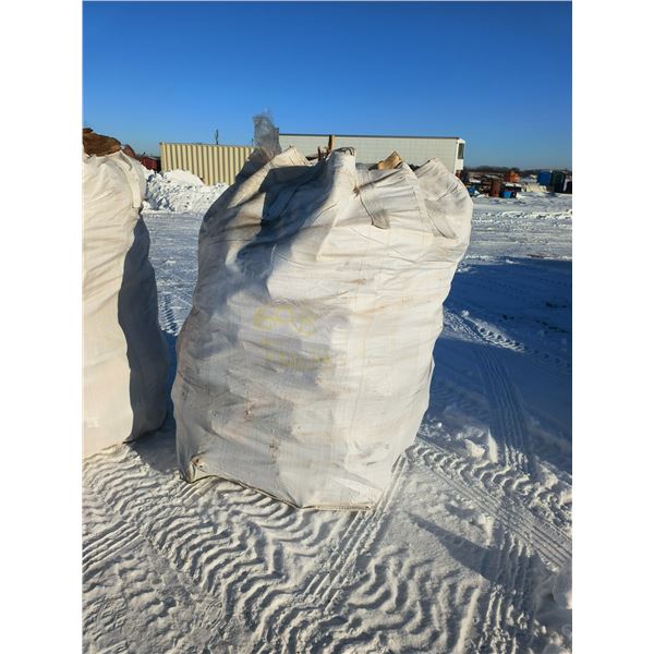 grain bag of split seasoned Jackpine firewood - 2/3 to 3/4 cord