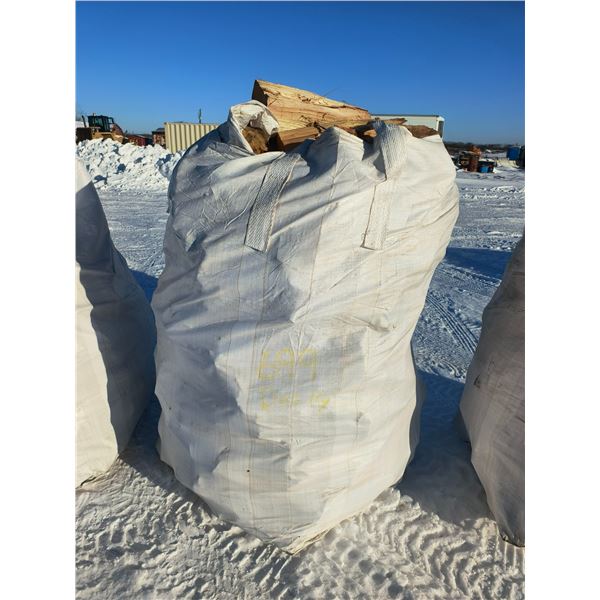 grain bag of split seasoned Jackpine firewood - 2/3 to 3/4 cord