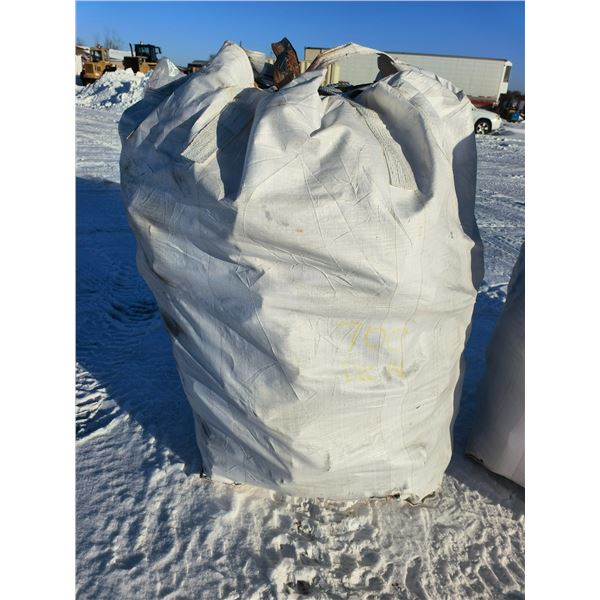 grain bag of split seasoned Jackpine firewood - 2/3 to 3/4 cord
