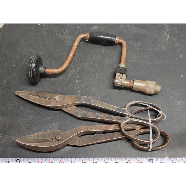 Pair of tin snips and hand crank drill