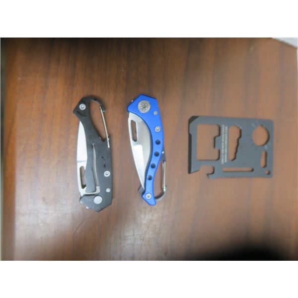 2 tactical pocket knifes and multitool