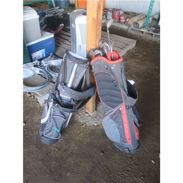 two golf bags with some clubs