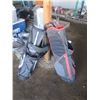 Image 2 : two golf bags with some clubs
