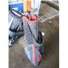 Image 7 : two golf bags with some clubs