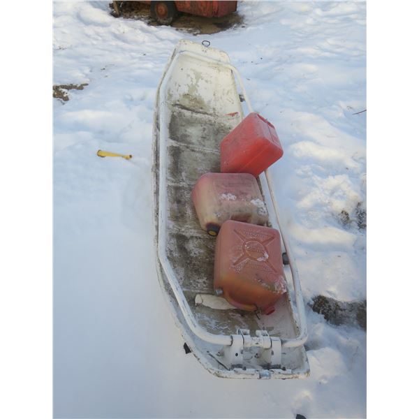 sleigh and 3 jerry cans