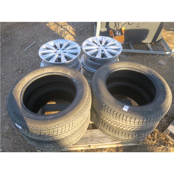 set of 4 rims and tires, 5 bolt Toyota rims