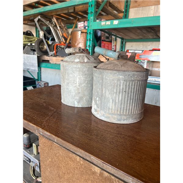 2- 1 gal galvanized gas cans