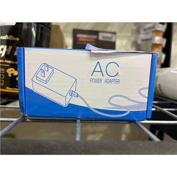 AC power adapter with assorted dongles