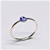 Image 1 : Silver Tanzanite(0.45ct) Rhodium Plated Ring (~Size 7)(Ring is resizable for $40) (~weight 1.06g)