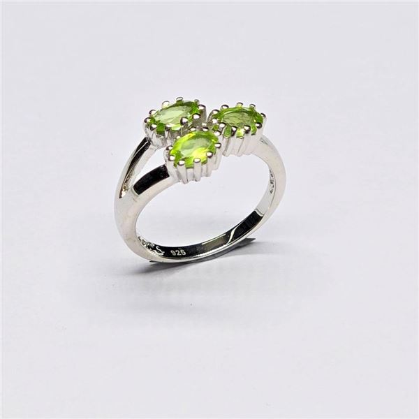 Silver Peridot(1.2ct) Rhodium Plated Ring (~Size 7)(Ring is resizable for $40) (~weight 3.32g)