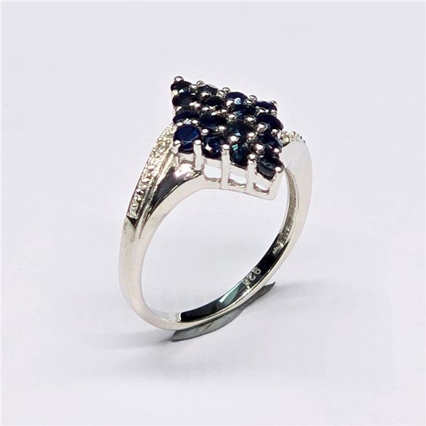 Silver Blue Sapphire(0.9ct) Rhodium Plated Ring (~Size 7)(Ring is resizable for $40) (~weight 3.17g)