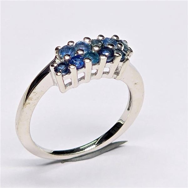 Silver Blue Sapphire(0.6ct) Rhodium Plated Ring (~Size 7)(Ring is resizable for $40) (~weight 2.88g)