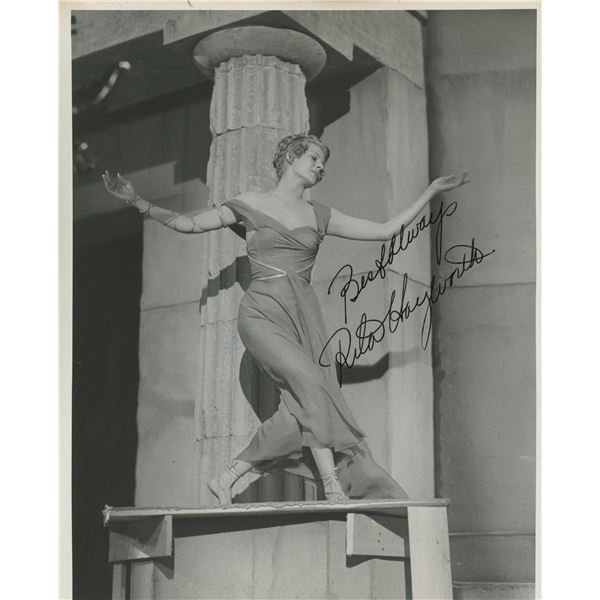 Rita Hayworth signed photo. GFA Authenticated