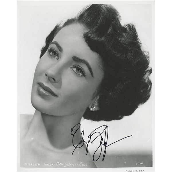 Elizabeth Taylor signed photo. GFA Authenticated