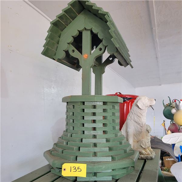 Green wooden garden well ornament