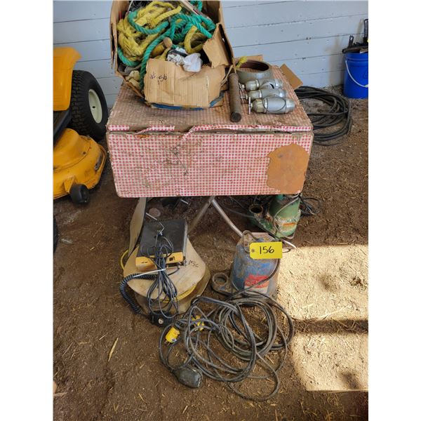 2- Sump pumps, CB radio, folding table, fittings, new rope & windshield