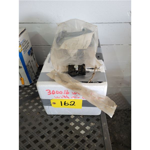 As New 3,000 lb winch c/w air compressor