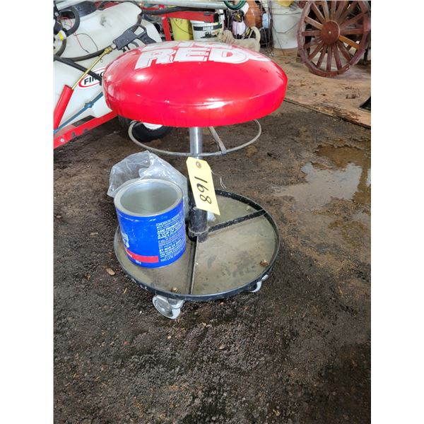 Red rolling shop stool